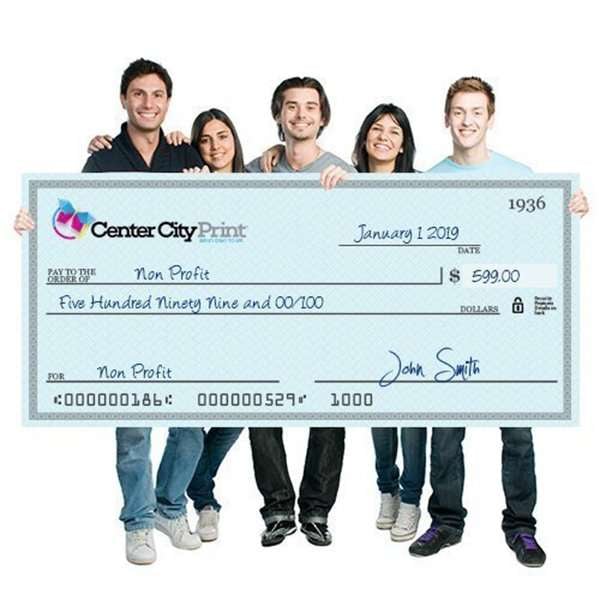 ||smiling people holding giant check for non-profit organization||large novelty check printed for non-profit organization